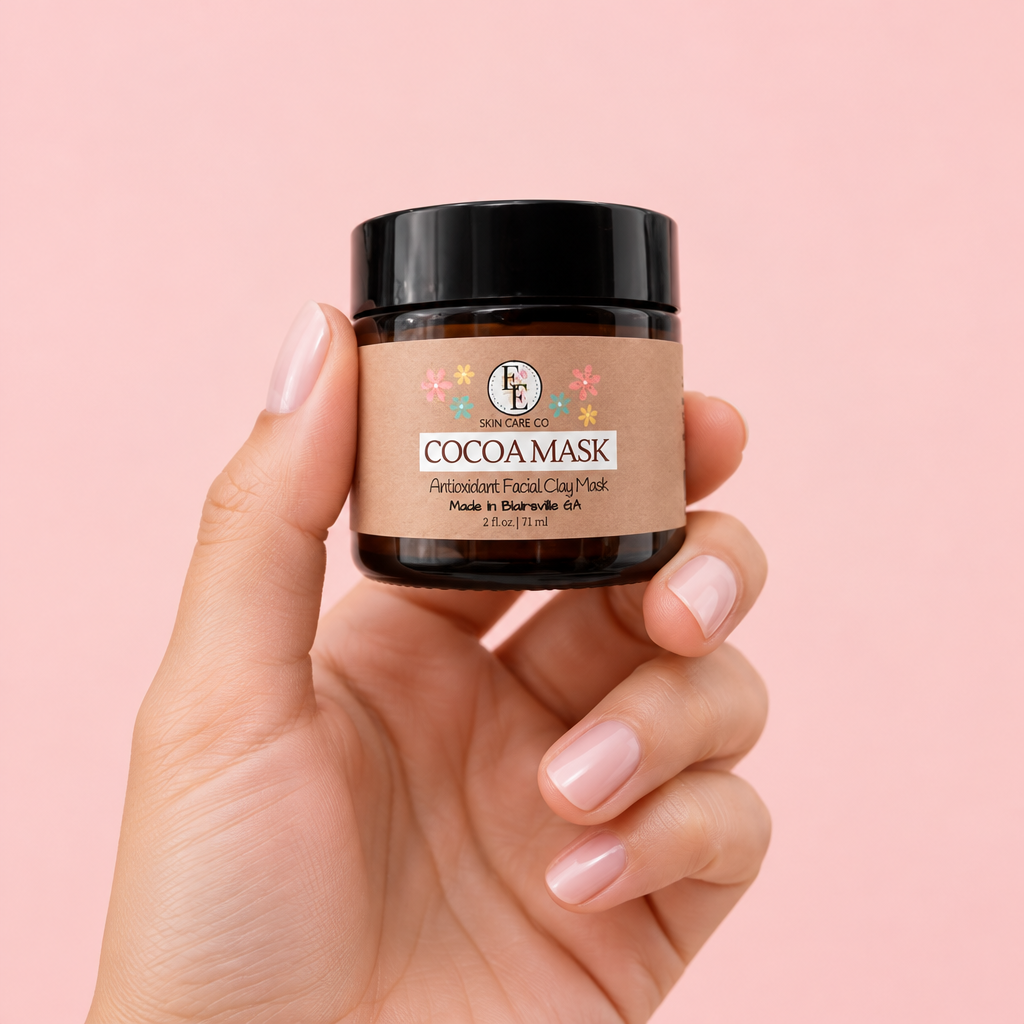Cocoa Clay Mask jar held in hand