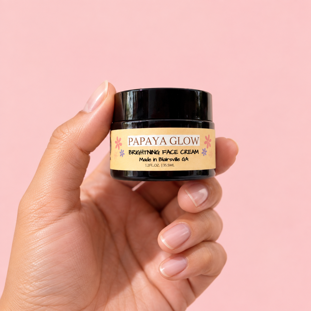 Papaya Glow jar held in hand