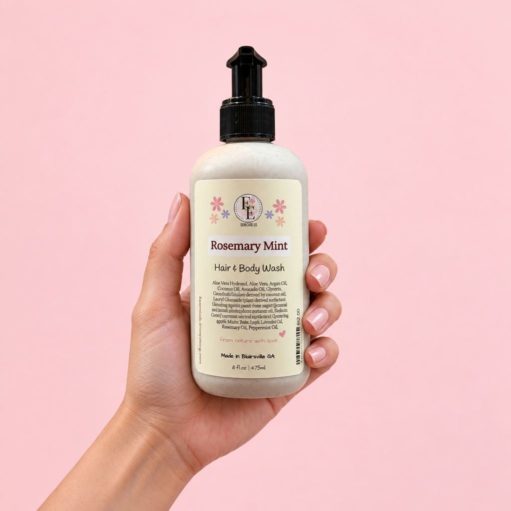 Rosemary Mint Hair and Body Wash bottle held in hand