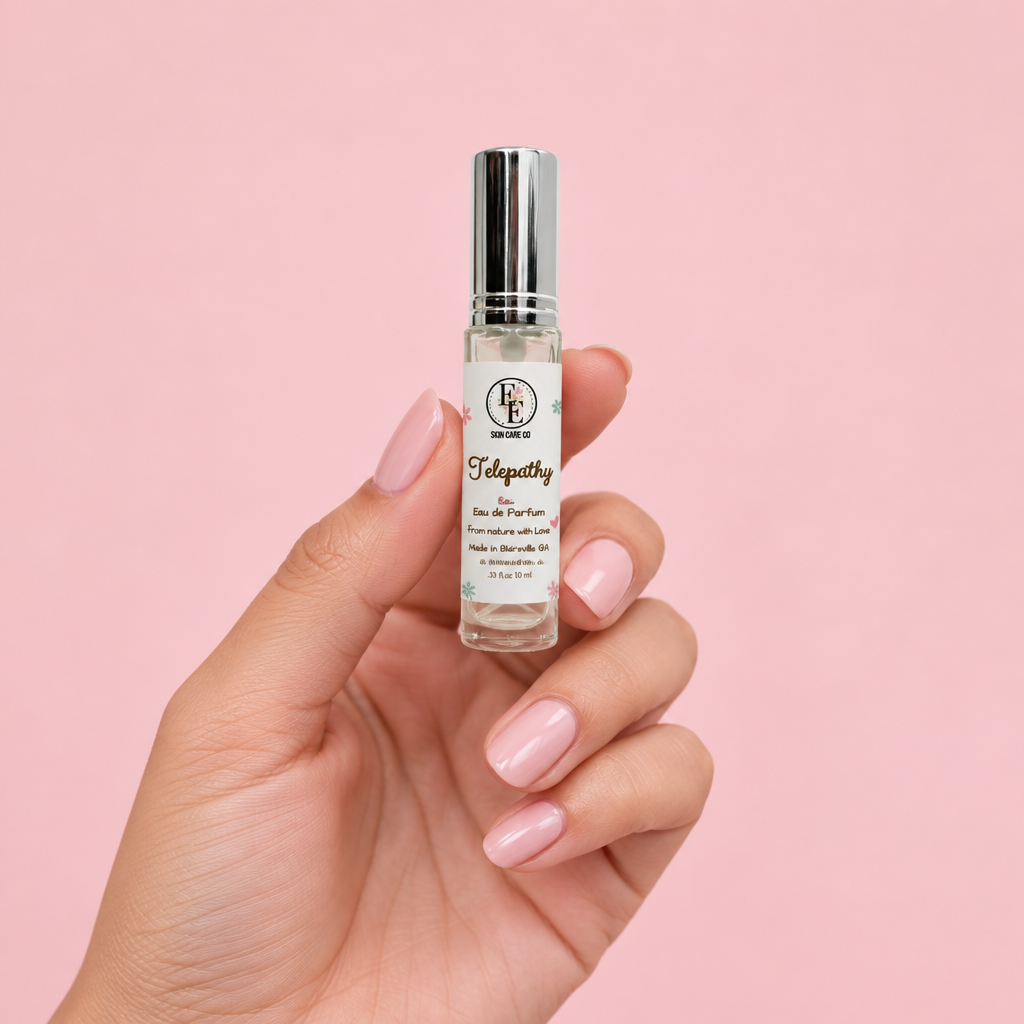 Telepathy travel perfume held in hand