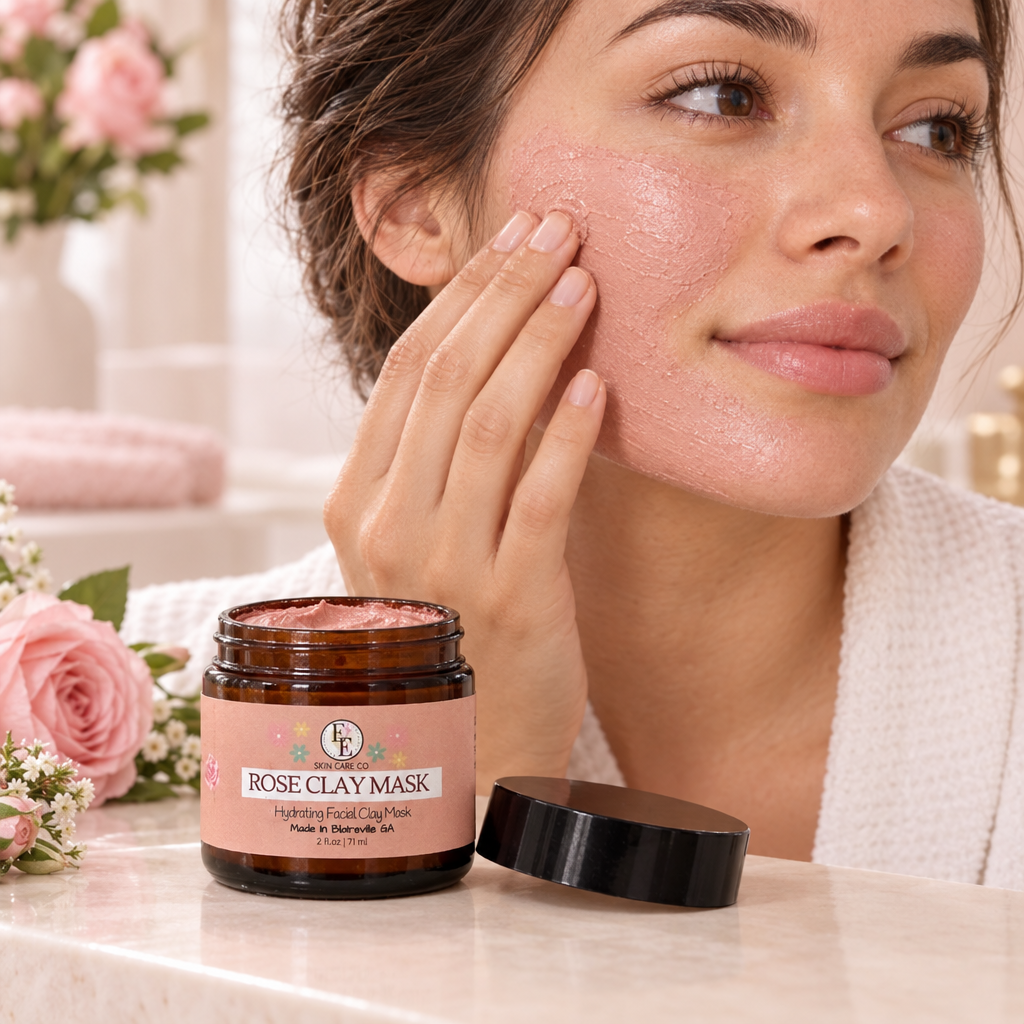 Woman applying Rose Clay Mask to her cheek